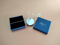 bracelet acier inoxydable dore perle résine blanc sophie bijoux