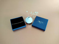 bracelet acier inoxydable doré et perles noir Sophie Bijoux