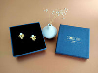 boucles d'oreilles devant derrière amovibles modulables feuille or et nacre blanche Sophie Bijoux