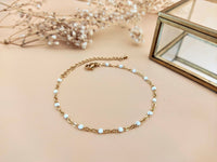 bracelet acier inoxydable dore perle résine blanc sophie bijoux