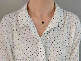 collier pendentif losange effet pailleté or et noir Sophie Bijoux
